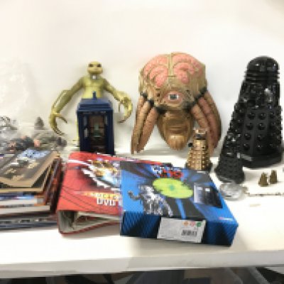 A collection of Doctor Who items including action figures&hellip;mask..books..dvds etc. no reserve