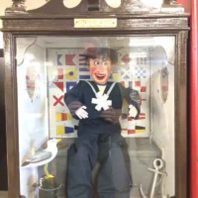 A Scratch Built Coin Operated Laughing Sailor approximate Height 180Cm and width 54Cm. Can Be Seen Working.