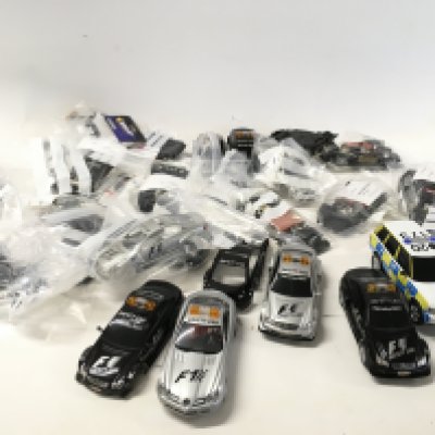 A collection of Scalextric cars..spare parts and accessories. No reserve