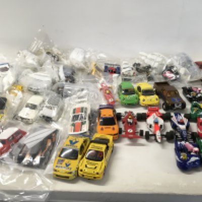 A collection of Scalextric cars..spares and accessories. No reserve