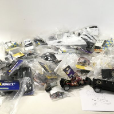 A collection of Scalextric Cars spare parts and accessories. No reserve