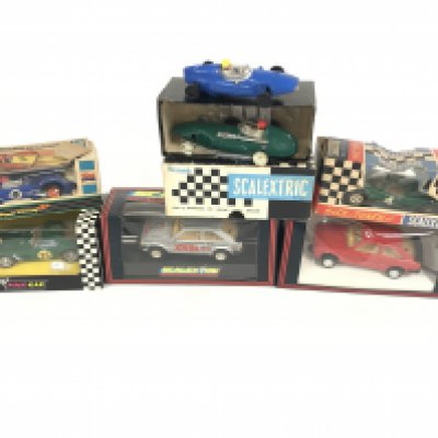 A collection of 7 Scalextric cars. Including some vintage examples. No reserve.