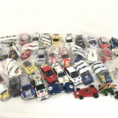 A collection of approximately 30 Scalextric cars. Plus some accessories and spares. No reserve.