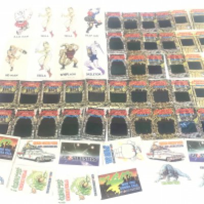 A Collection of Vintage promotional Cereal Stickers including He-Man. Ghostbusters.Dungeons And Dragons and Inspector Gadget. No Reserve.