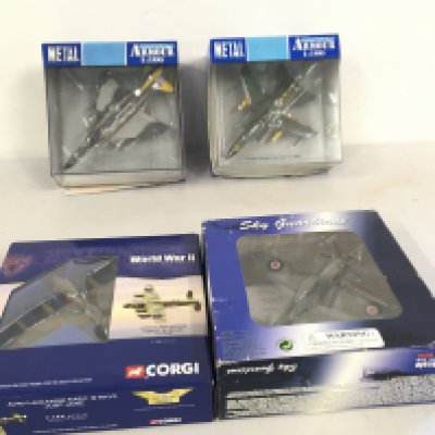 A collection of 4 boxed model military aircraft by Corgi..Sky Guardians and Metal