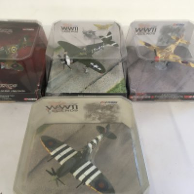 A collection of 4 model military aircraft by Corgi in original display packaging. All from the WWII Legends series.