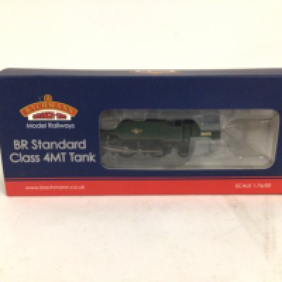 A boxed Bachmann locomotive 32 353. BR Standard Class 4MT Tank 80135. BR Green late Crest. DCC No reserve.