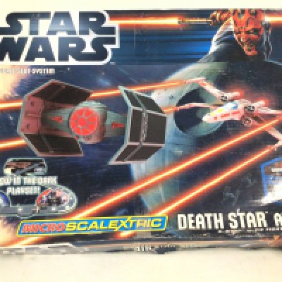 A boxed STAR WARS micro Scalextric set DEATH STAR ATTACK. No reserve