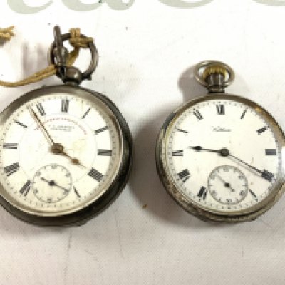 2 vintage silver cased pocket watches. (A)