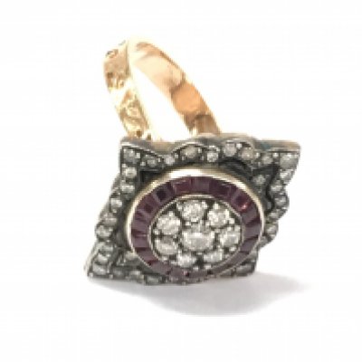 An unhallmarked Georgian style rose gold marquise shaped ring set with diamonds and calibre cut rubies. Diamonds 0.55ct and rubies 0.38ct Approx. Size O 1/2.