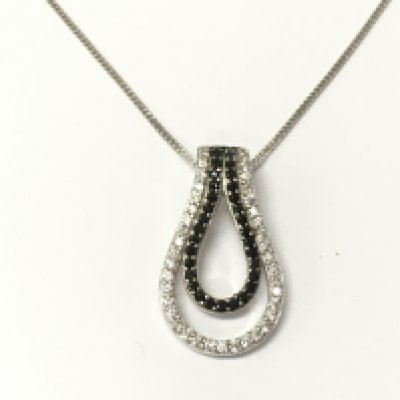 A double pair shaped silver pendant set with black and white cubic zirconia on a silver chain. Postage A