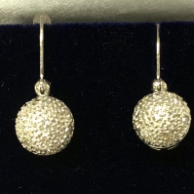 A pair of 18ct white gold droplet earrings set with diamond ball cluster with omega fastenings. Diamonds 0.18ct approx.