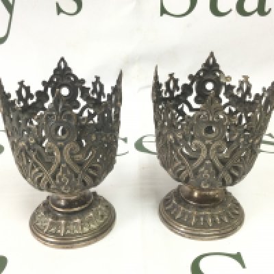 A pair of 900 silver candlesticks with elaborate piercework decoration, approx height 10cm. Shipping category A.