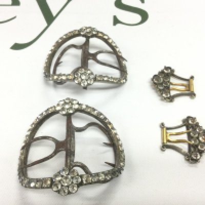 Four antique buckles. Shipping category A.