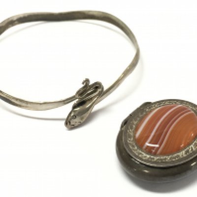 A silver pill box and a silver snake bangle. Postage catA