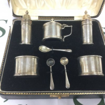 A cased silver cruet set, Birmingham hallmarks. Shipping category B.