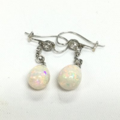 A pair of white gold diamond and opal drop earrings, approx 3.6g. Shipping category A.