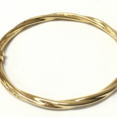 A 9ct gold bangle, 5.4g total weight. postage category A