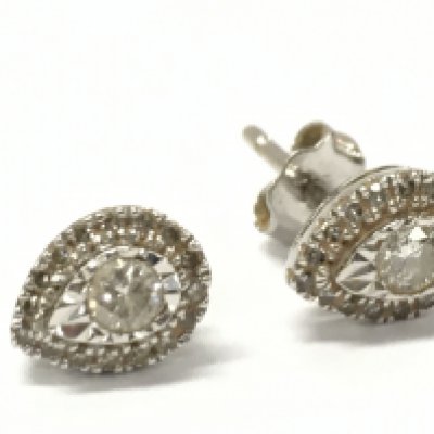 9ct gold tear drop diamond studs, one damaged . Total weight 1.18g . Postage category A