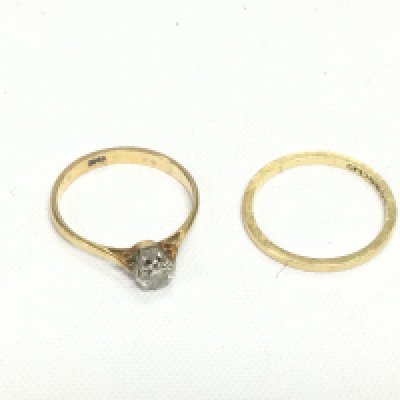An 18ct gold 0.15ct diamond solitaire ring and an 18ct gold wedding band (2). Approx total weight 3.2g and approx sizes K-L. Shipping category A.