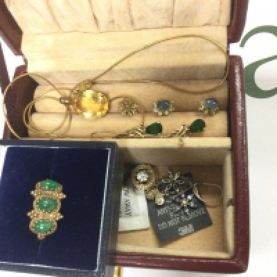 A small collection of mixed gold earrings and pendants. Shipping category A.