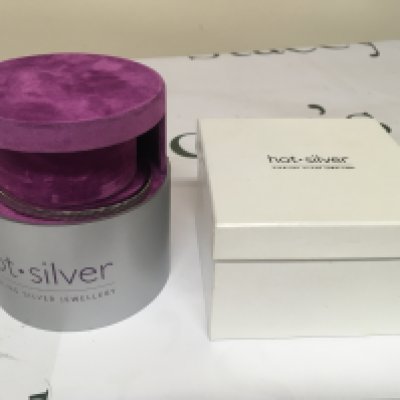 A modern design Hot Silver silver bangle bracelet with a patterned edge stamped 925. With inner display box and outer box.