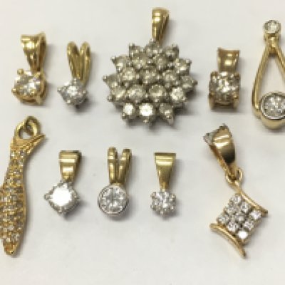 18ct gold assorted diamond pendants , 10g total weight. Postage category A
