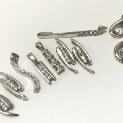 9ct White gold assorted diamond pendants, 9g total weight, postage category A