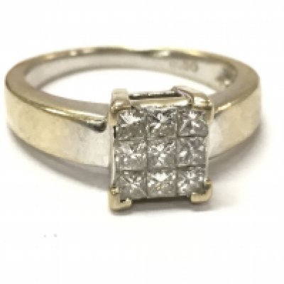 An 18ct white gold 9x princess cut diamond cluster ring. 4.6g L/M. Postage category A