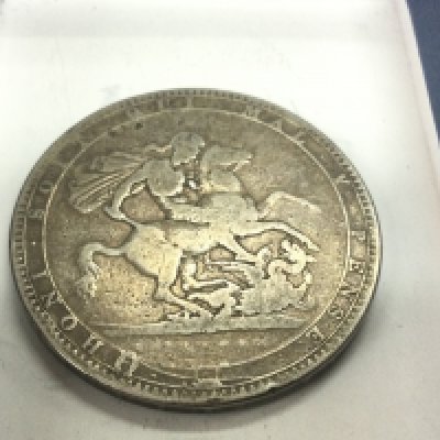An 1819 Crown coin. Shipping category A.
