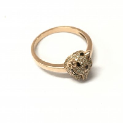 A 14k stamped rose gold gold panther ring with a stone set head. Approx weight 2.85 grams. Size P.