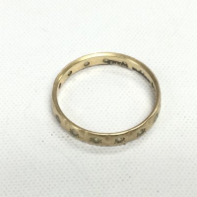 A 9ct gold ring set with stones, approx 1.4g and approx size N. Shipping category A.