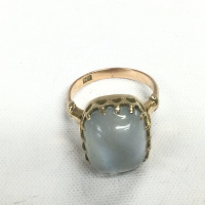 A 9ct gold ring set with an opal, approx 5g and approx size L. Shipping category A.