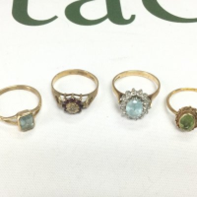 Four 9ct gold rings set with stones, total approx 8.8g. Shipping category A.