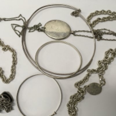 A collection of jewellery including silver including bracelets and necklaces.