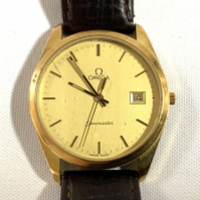 A vintage gold plated Omega Seamaster date, Quartz. (A)
