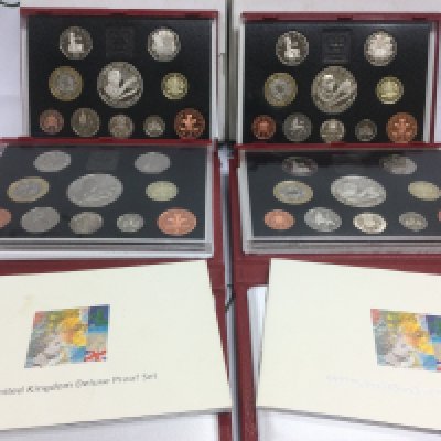 Eight GB coin proof sets. Shipping category B.
