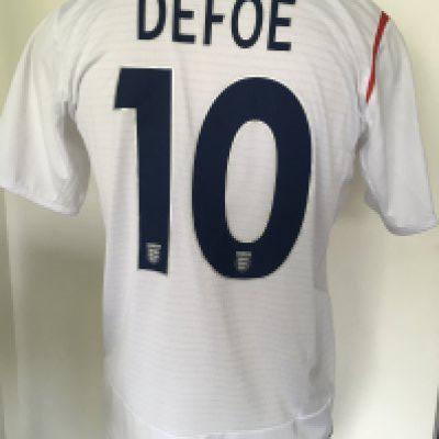 Defoe England Match Worn Football Shirt: White short sleeve shirt with number 10 Defoe to rear. Front has number 10 Macedonia v England 6 9 2006. Euro 2008 patching to right arm.