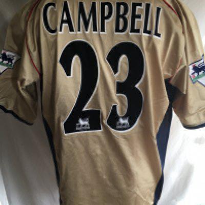 Arsenal 2002 FA Cup Semi Final Match Worn Football Shirt: Gold Nike Sega short sleeve shirt with Premier League patches to arms and 23 Campbell to rear. C/W the shorts worn and a card signed by Soo Campbell stating these were worn by him v Middlesbrough at Old Trafford.
