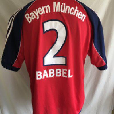 Bayern Munich 1999 - 2000 Match Worn Football Shirt: Red short sleeve with number 2 Babbel to rear. Bundesliga badge to right arm. Babbel wore this in the season Bayern were champions. Signed and dedicated to friends of Babbel.