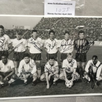 1989 + 1982 England Signed Football Photos: Collected by official photographer for the match away to Albania 1989 and the 9-0 win in Luxembourg 1982. Signed by 11 players on each including John Barnes, Gary Lineker, Bryan Robson and Terry Butcher to 1989 and Alvin Martin, Gary Mabbutt and Luther Blissett to 1982 photo. Press annotations to rear. (2)