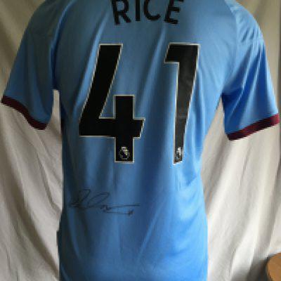 Declan Rice West Ham Signed Photo + Shirt: 2020 125 years shirt with Rice 41 to rear where he has signed. Large photo is framed and depicts Declan surrounded by bubbles at the London stadium. Clearly signed in silver marker. (2)