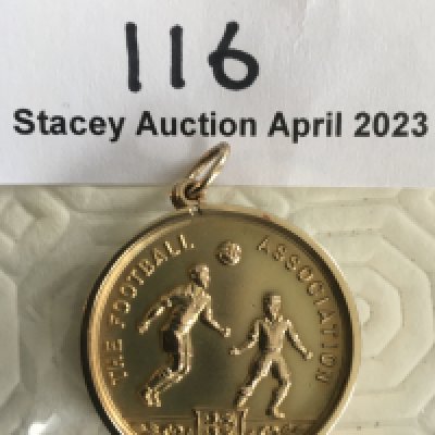 1946 Charlton Athletic FA Cup Final Football Medal: Gold medal with ring suspension awarded to Sailor Brown for playing in the first FA Cup final after the war v Derby County. Front shows two players and the words Football Association with small 3 Lions shield. Reverse has the original words FA Runners Up and above engraved CAFC ARJ Brown 1945-6. Excellent condition without original box.