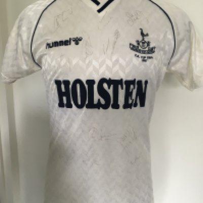 Tottenham 1987 FA Cup Final Match Issued Football Shirt: White short sleeve Hummel shirt with Holsten sponsor. FA Cup Final 1987 embroidered to breast and number 15 to rear. Signed by 13 Spurs players lightly but clearly. Verbally told the shirt was given to Tony Galvin but not proven. If it was issued to Galvin it would be the last shirt issued as he transferred in the summer. This was the first FA Cup final that was allowed two subs per team and 12 and 14 were used for that. It was customary at the time to produce up to 18 shirts by clubs.