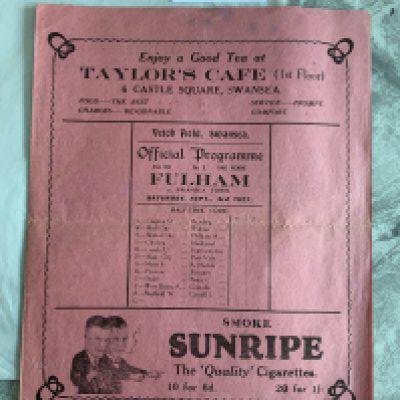 1927 - 1928 Swansea Town v Fulham Football Programme: Very good condition with no team changes. Very large 4 page pink programme which has a fold and will be sent folded.
