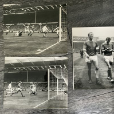 1963 FA Cup Final Football Press Photos: 10 x 8 inch photos with press stamps and annotations to rear. Two feature Manchester Uniteds Herd scoring, the other Herd and Law walking off the Wembley pitch with medals. (3)