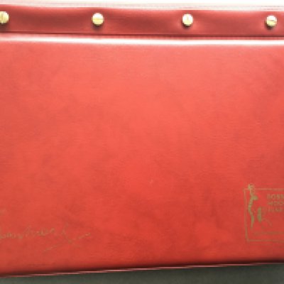 Rare Bobby Moore Fund 1966 World Cup Football Album: Official folder stating Bobby Moore fund with a facsimile autograph to cover. Limited edition number 378/1966 album hand signed by Stephanie Moore. Inside is a photo clipped into card page with annotations of Bobby during the World Cup. Very rare must view album with 19 photographs.