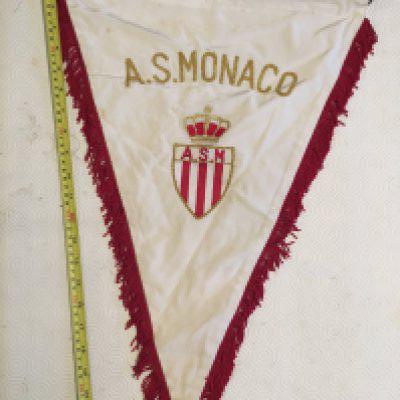 Monaco Exchange Football Pennant: Almost certainly given by A.S. Monaco to an opposition team. Very likely to be a UEFA Cup match around 1980. Very large expensively engraved in gold. 21 inch long material. Nice item.