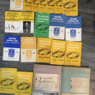 Watford Football Memorabilia Box: Includes late 50s early 60s handbooks some multi signed including a complete run from 57/58 to 66/67, tickets including 70/71 away Swindon LC, photos including a few press photos, scrapbooks including the 59/60 season with programmes inside. (box)
