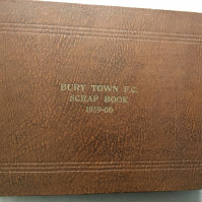 Bury Town Football Scrapbook 1959 - 1960: Title is the exact words embossed on what was possibly the clubs own scrapbook. Inside cover has 14 autographs of the players and the rest has concise 1st team and reserves match reports plus programmes.